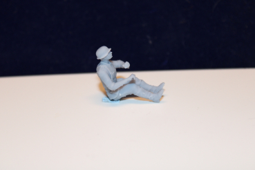 48F004-1 german air force 2 cm quadgun soldier loader sitting on the left side